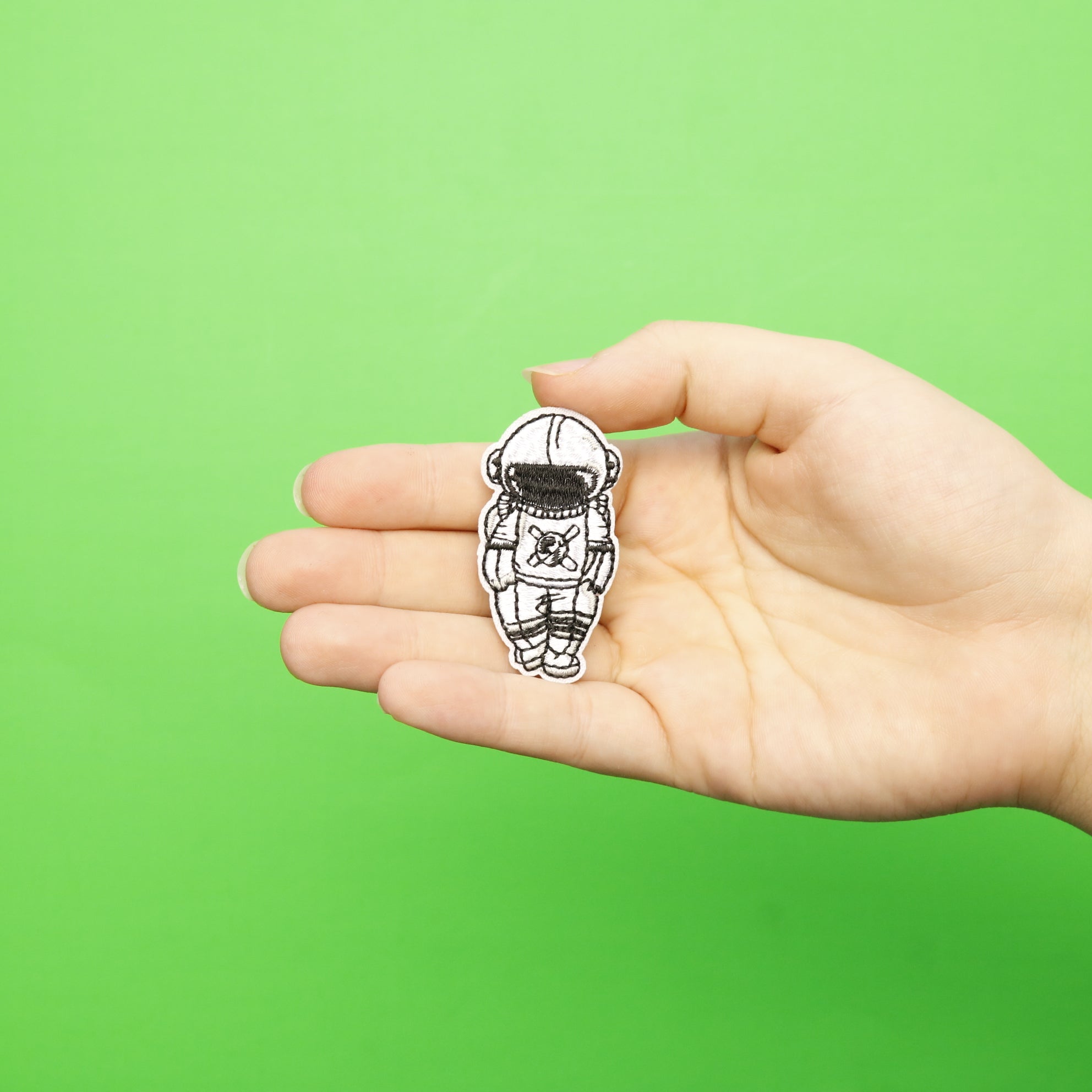 Small Sad Grey Astronaut Embroidered Iron On Patch