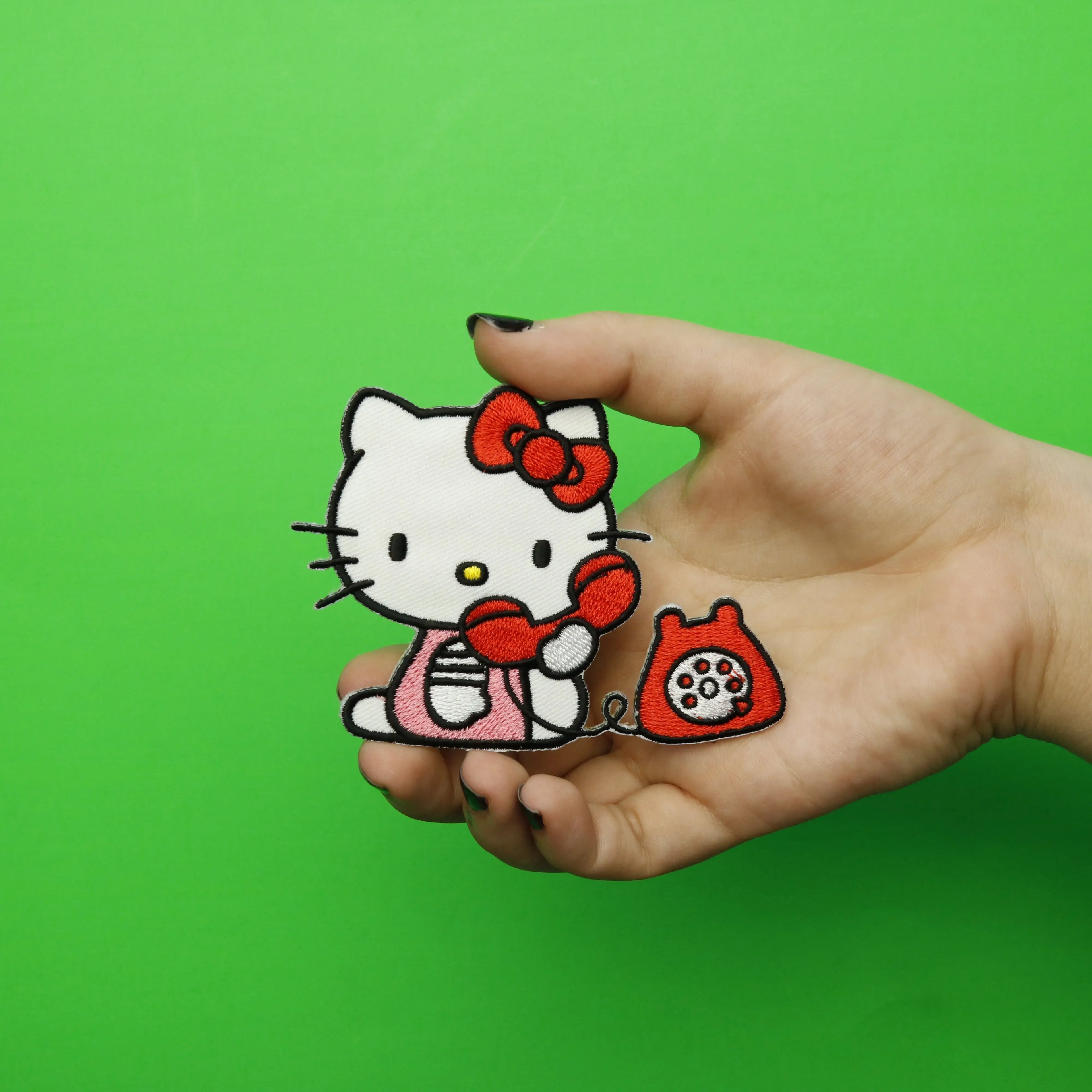 Hello Kitty on Red Telephone Iron On Embroidered Patch