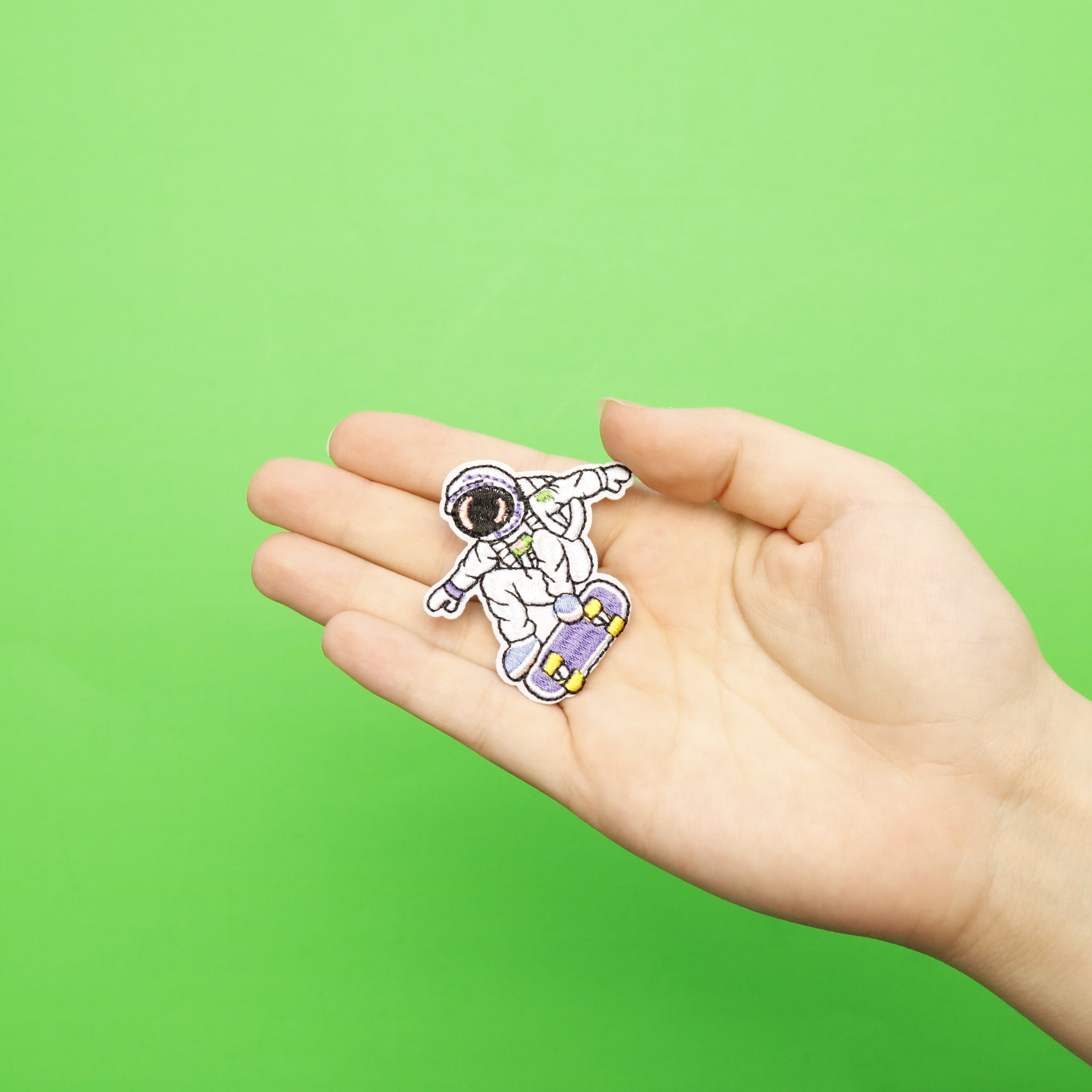 Small Astronaut Riding A Skateboard Embroidered Iron On Patch