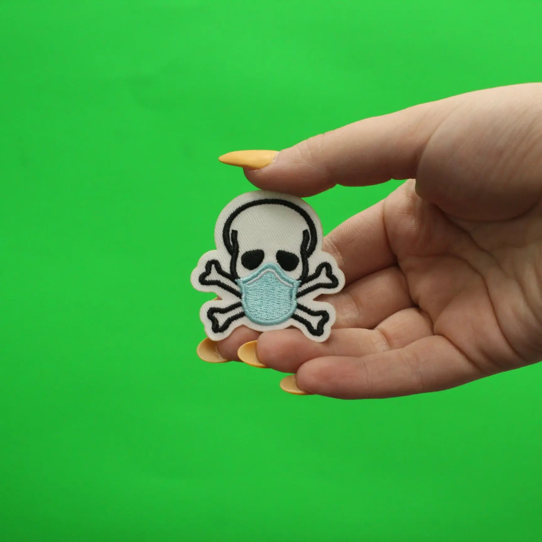 Skull And Crossbones Wearing A Mask Embroidered Iron-On Patch