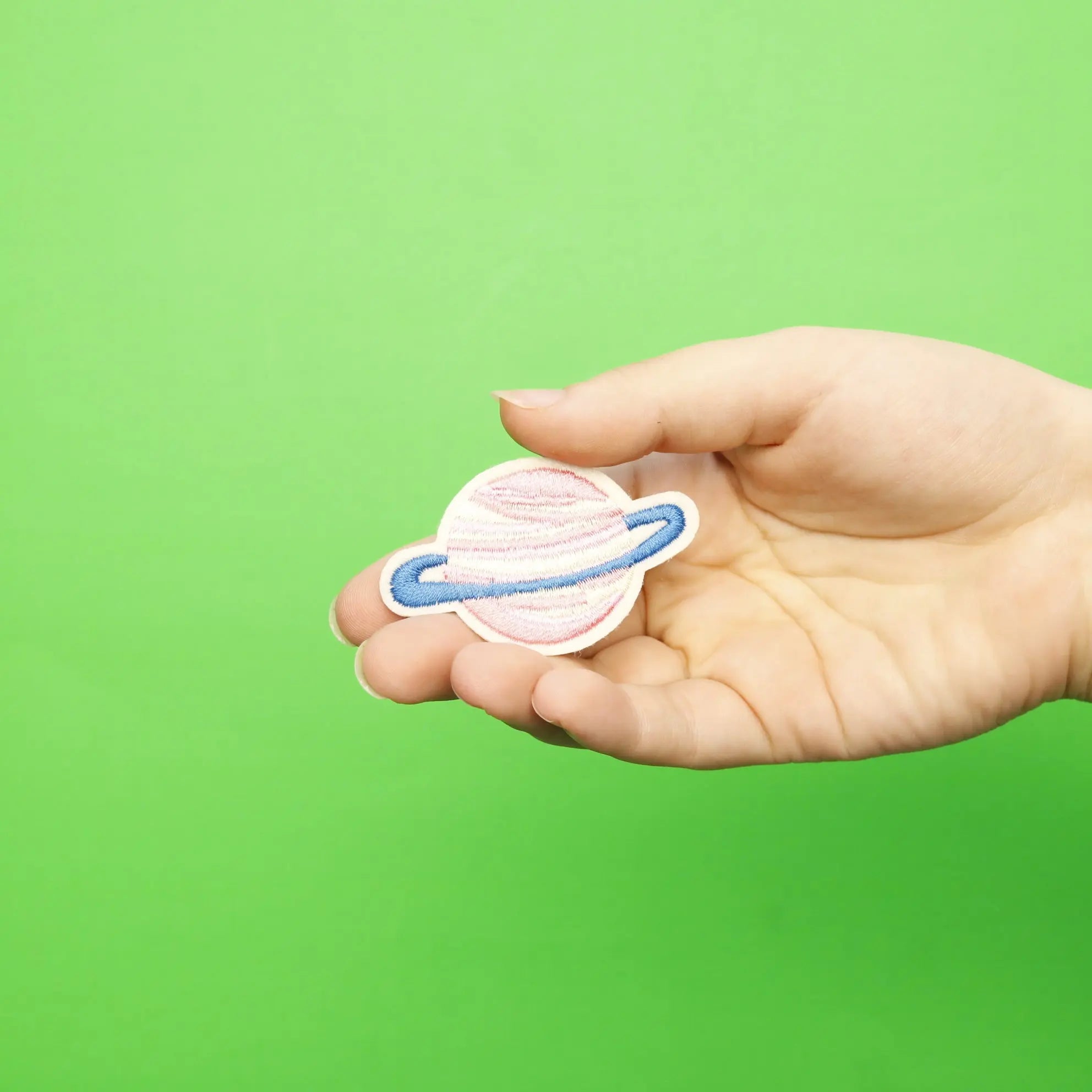Small Pink Planet With Blue Ring Embroidered Iron On Patch